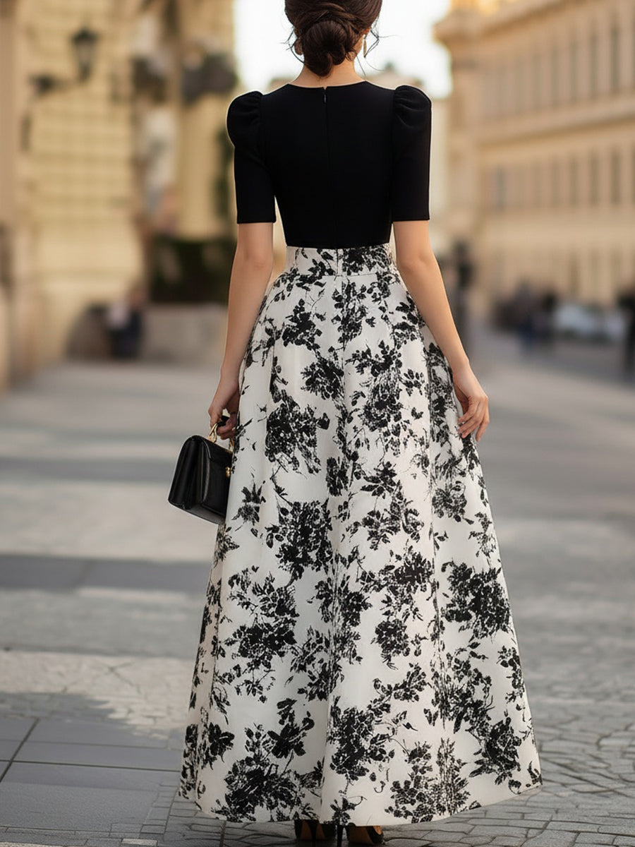 Robe noire à manches bouffantes et motif floral Zafren