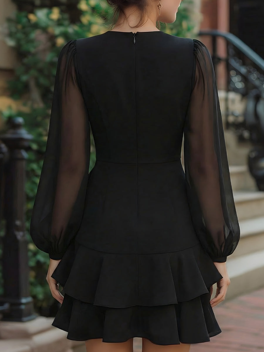 Robe Zafren noire à manches transparentes et volants
