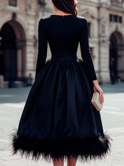 Robe midi noire à ourlet en plumes Zafren