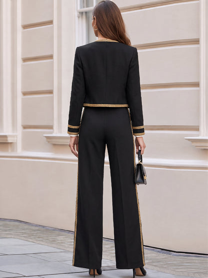 Tailleur pantalone nero stile militare con trecce decorative Zafren