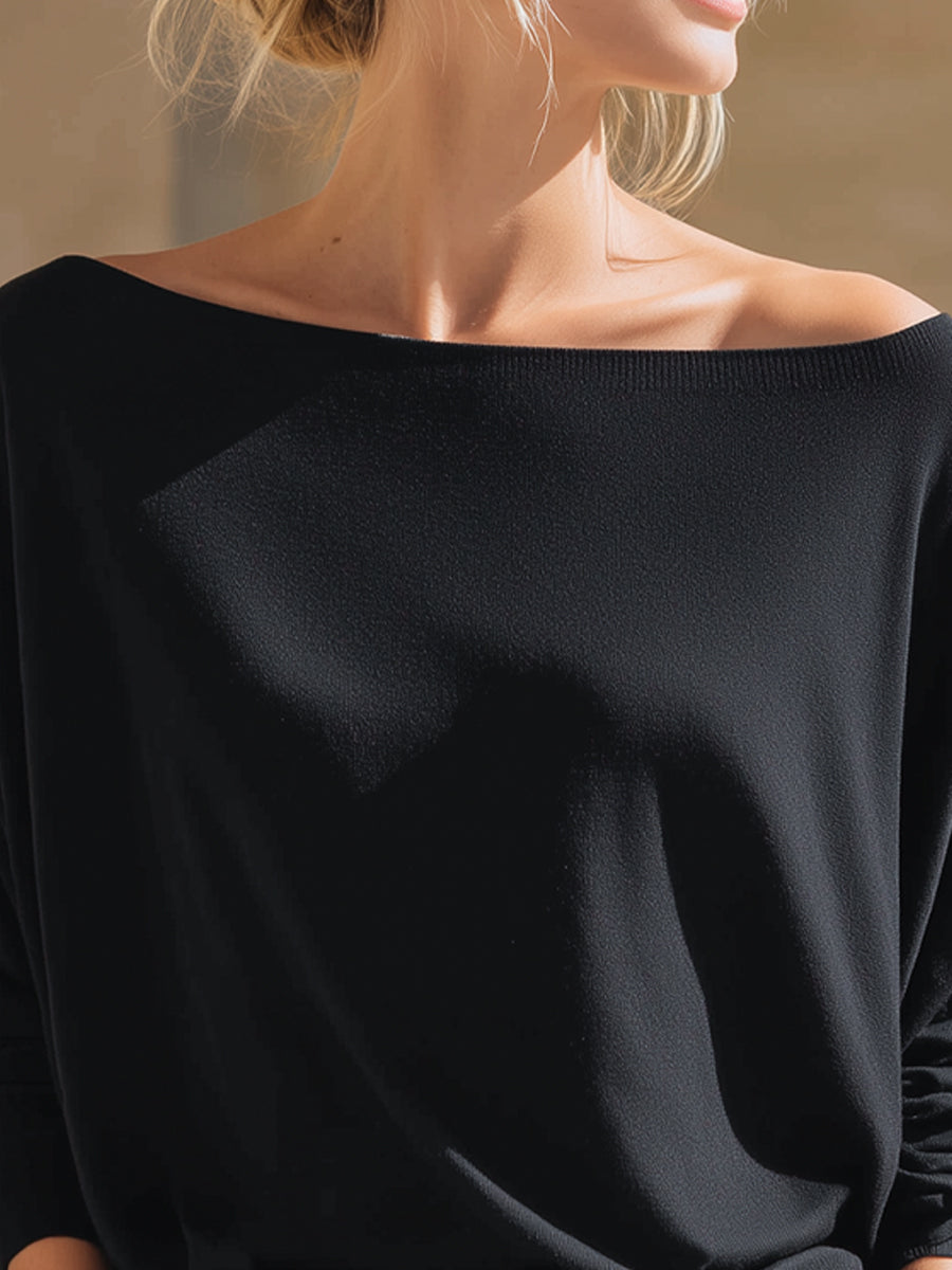Top Zafren nero in maglia, scollo bardot e maniche a pipistrello