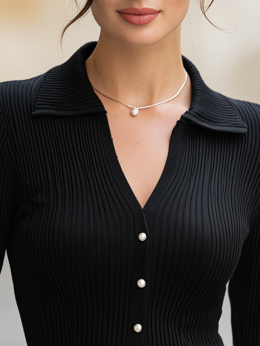 Maglione polo Zafren nero con bottoni di perla