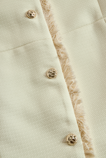 Blazer Zafren color crema con finiture sfrangiate e texture