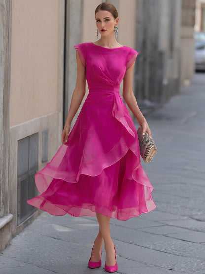 Robe Zafren à manches courtes et organza superposé