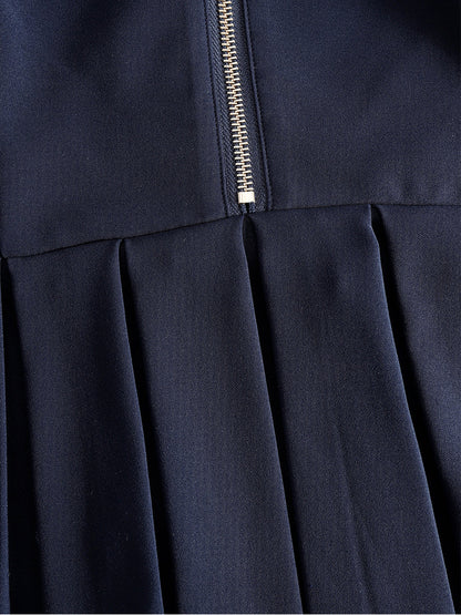 Robe Zafren bleu marine à plis et fermeture éclair sur le devant