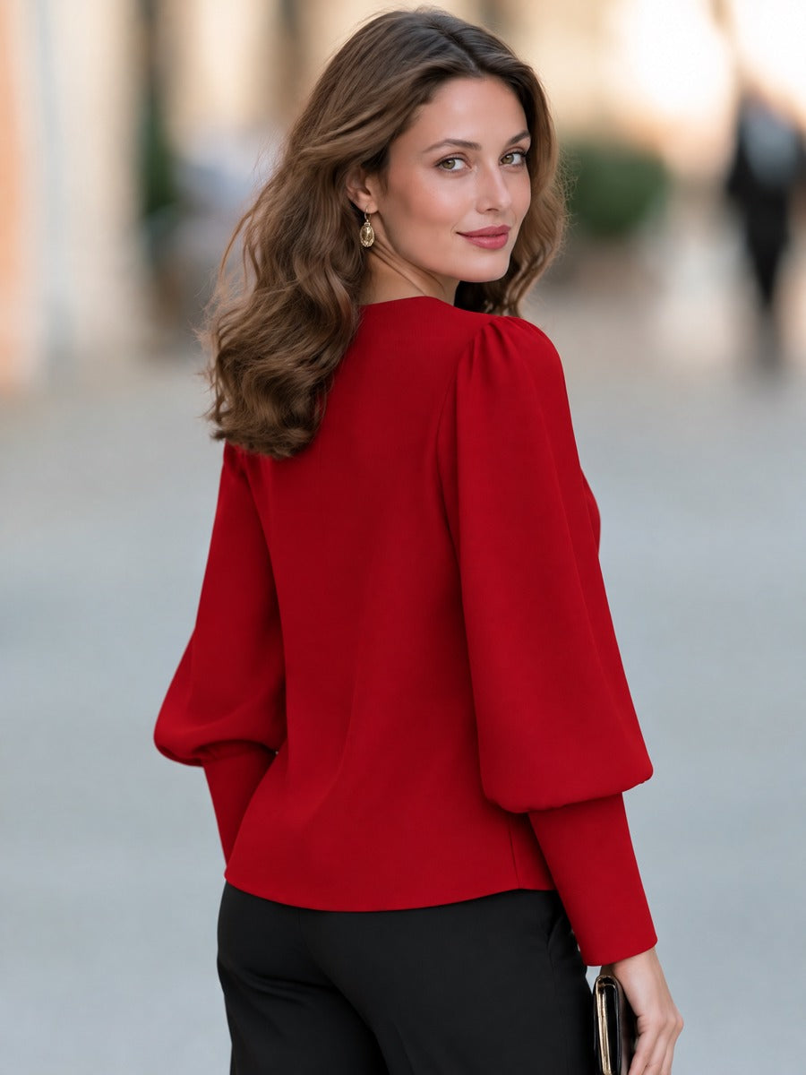 Blusa rossa Zafren con maniche a sbuffo e bottoni