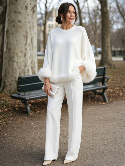 Maglione Zafren bianco con bordi in pelliccia sintetica