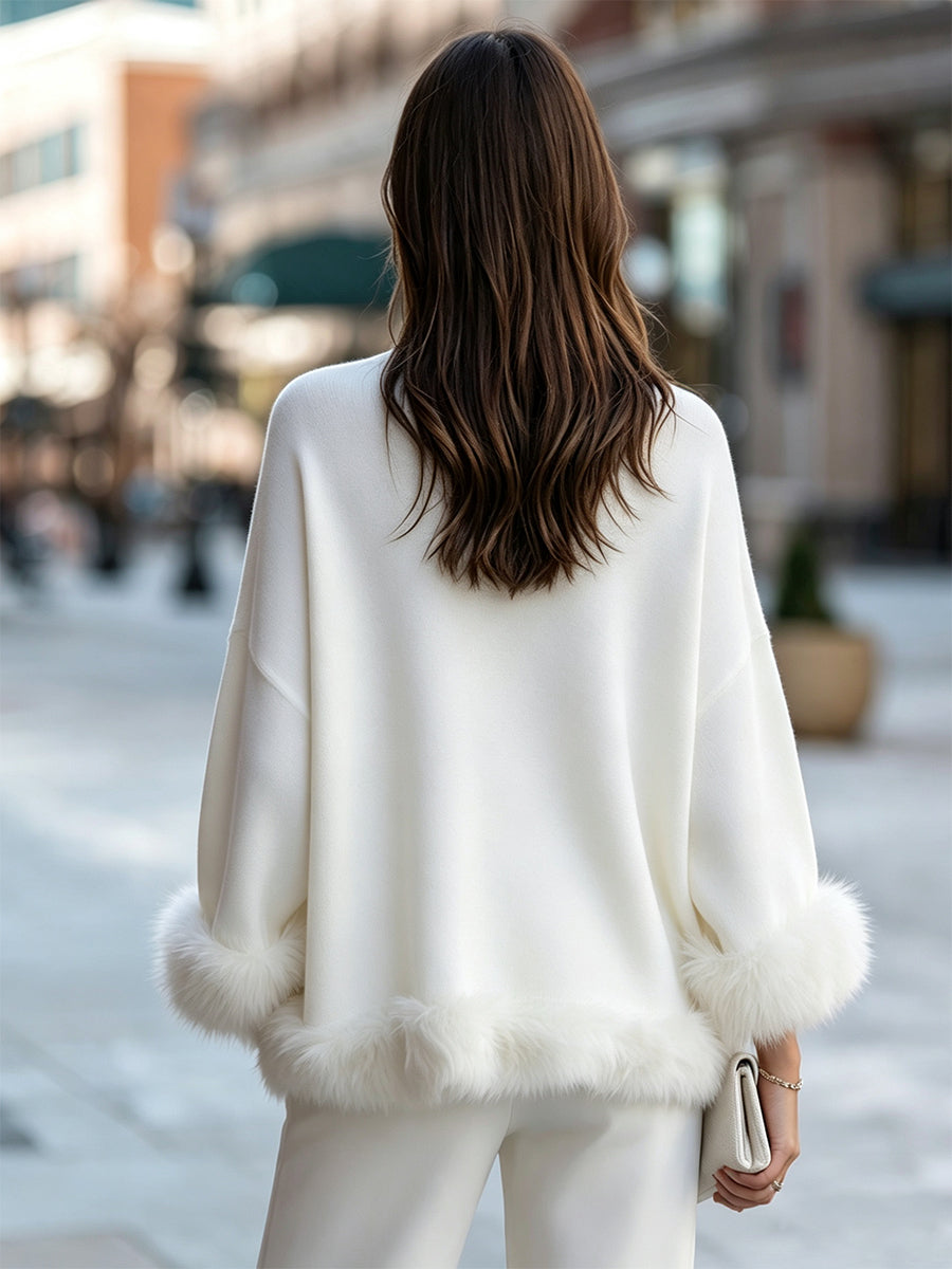 Maglione Zafren bianco con bordi in pelliccia sintetica