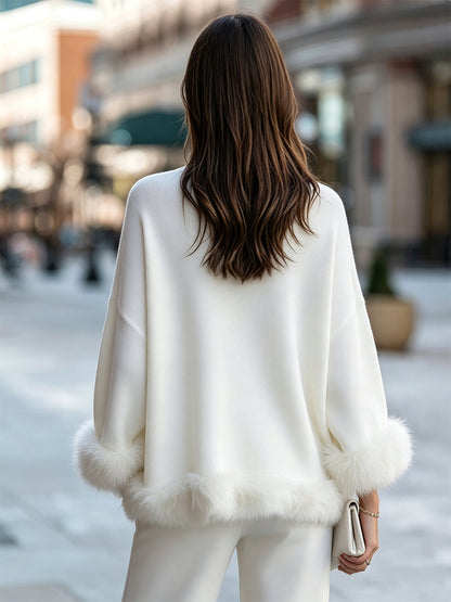 Maglione Zafren bianco con bordi in pelliccia sintetica